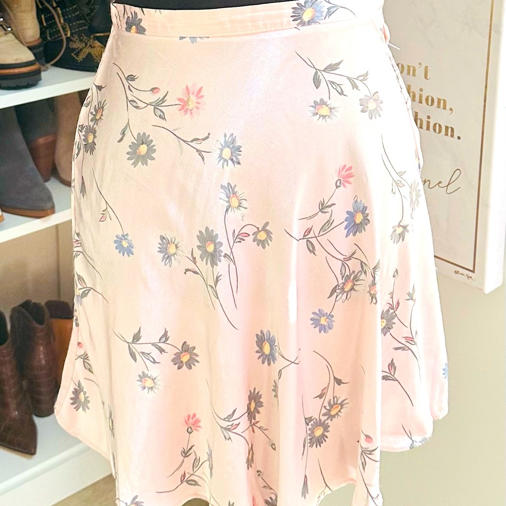 This skirt is perfect for adding a touch of romance and femininity to any outfit
